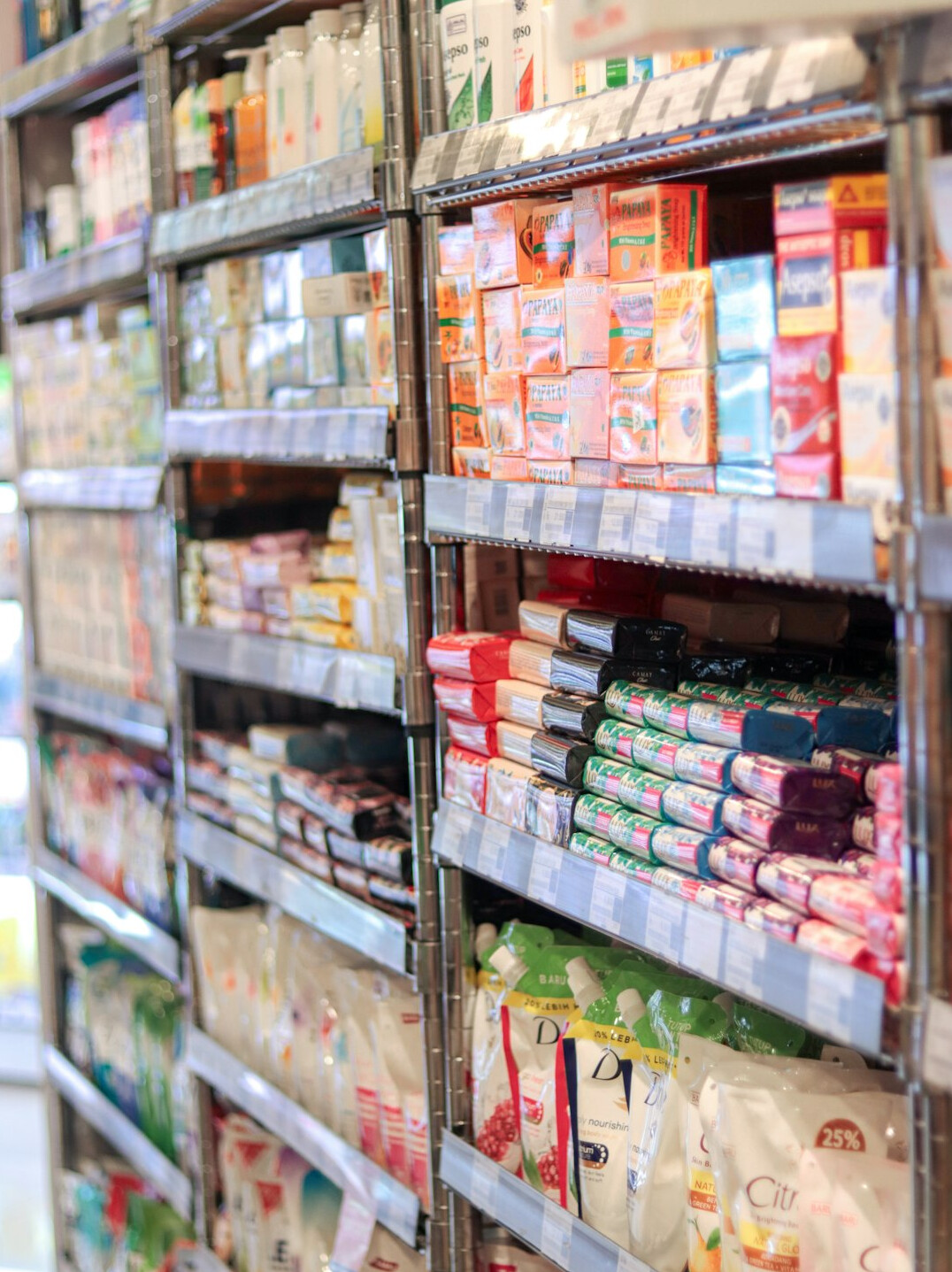 woman in supermarket aisle