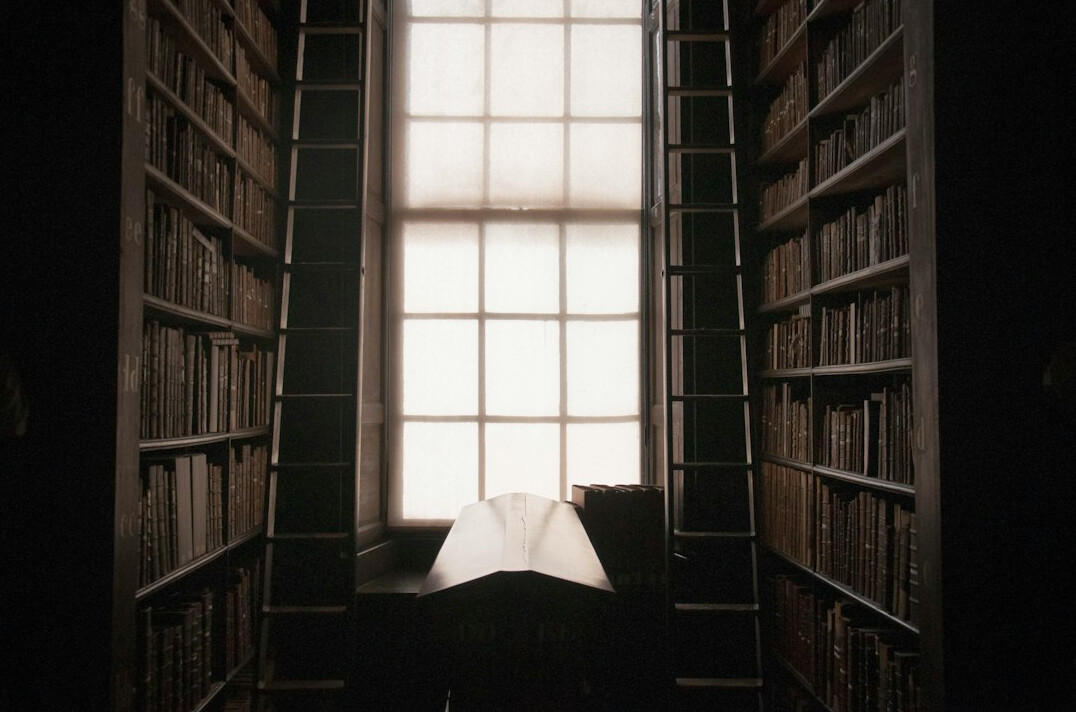 Interior of an old library with tall bookshelves