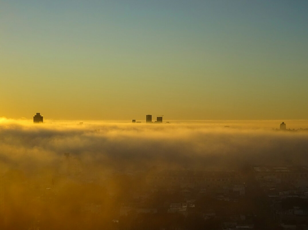 Foggy harbor pier at dawn in Montevideo