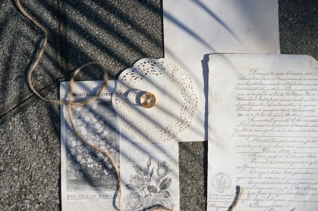Stack of old documents and folders tied with string